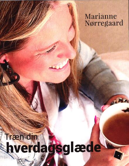 Cover for Marianne Nørregaard · Træn din hverdagsglæde (Sewn Spine Book) [1st edition] (2017)