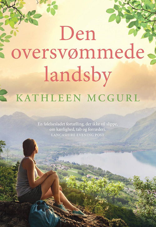 Cover for Kathleen McGurl · Den oversvømmede landsby (Heftet bok) [1. utgave] (2023)