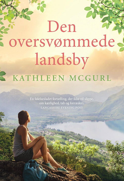 Cover for Kathleen McGurl · Den oversvømmede landsby (Taschenbuch) [1. Ausgabe] (2023)