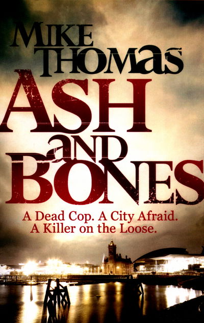 Cover for Mike Thomas · Ash and Bones: A Dead Cop. A City Afraid. A Killer on the Loose. (Paperback Book) (2016)