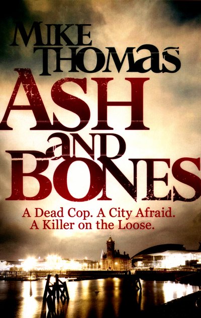 Cover for Mike Thomas · Ash and Bones: A Dead Cop. A City Afraid. A Killer on the Loose. (Pocketbok) (2016)