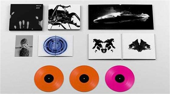Cover for Massive Attack · Mezzanine (3lp Super Dlx 2018 Remaster) (LP) [Coloured edition] (2019)