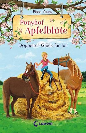 Ponyhof Apfelblüte (Band 21) - Doppeltes Glück für Juli - Pippa Young - Kirjat - Loewe - 9783743214637 - keskiviikko 8. maaliskuuta 2023