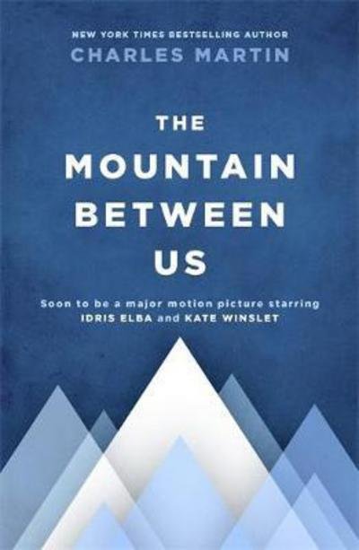 Cover for Charles Martin · The Mountain Between Us: Now a major motion picture starring Idris Elba and Kate Winslet (Paperback Bog) (2017)