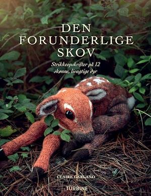 Cover for Claire Garland · Den forunderlige skov (Sewn Spine Book) [1º edição] (2021)