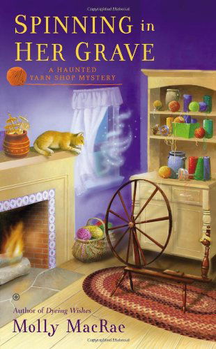 Cover for Molly MacRae · Spinning in Her Grave: A Haunted Yarn Shop Mystery - Haunted Yarn Shop Mystery (Taschenbuch) (2014)