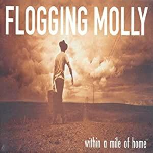 Flogging Molly · Within A Mile Of Home (Eco Mix Tobacco Vinyl) (LP) (2025)