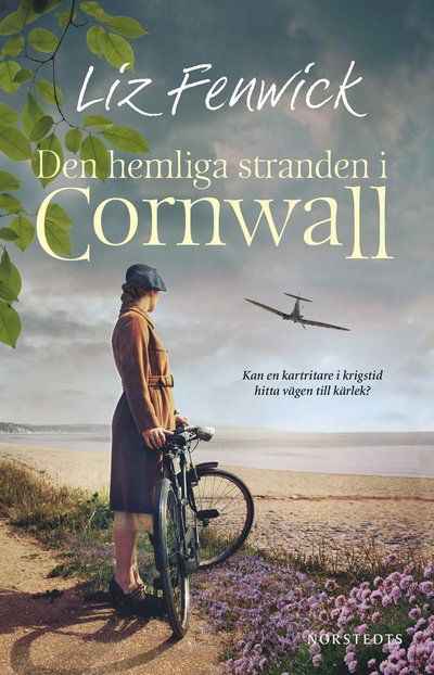 Cover for Liz Fenwick · Den hemliga stranden i Cornwall (Bound Book) (2023)