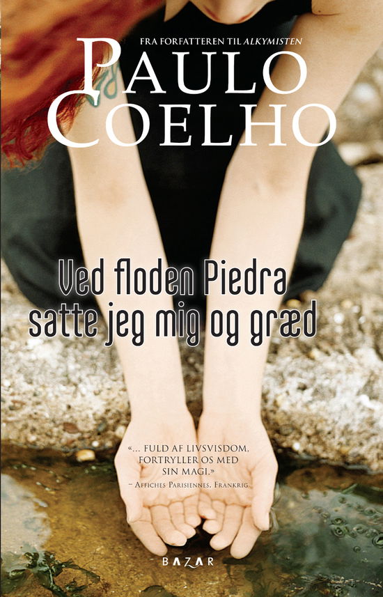 Cover for Paulo Coelho · Ved floden Piedra satte jeg mig og græd (Paperback Book) [1. Painos] [Paperback] (2012)