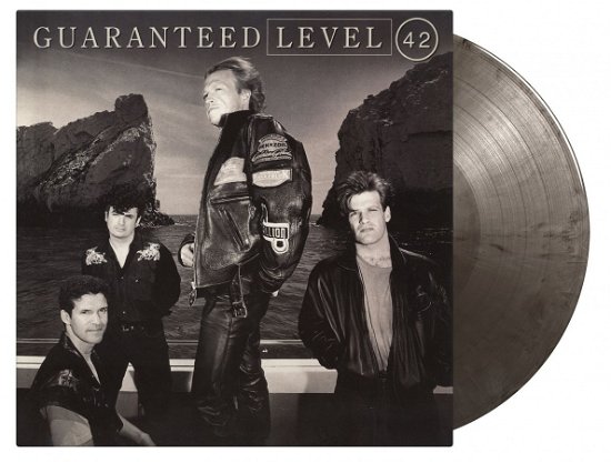 Cover for Level 42 · Guaranteed (LP) [Expanded Silver &amp; Black Vinyl edition] (2022)