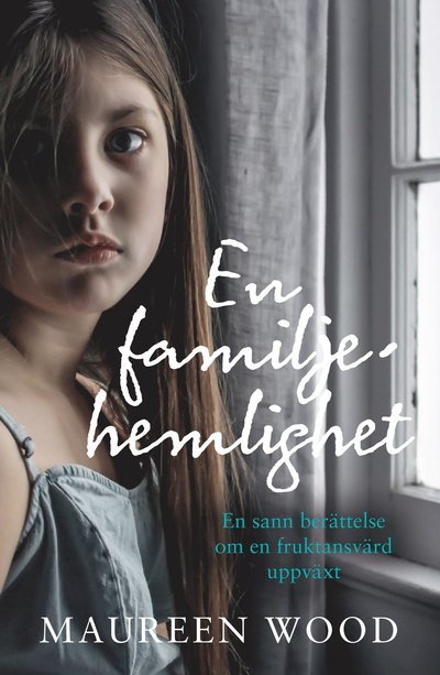 Cover for En familjehemlighet (Paperback Book) (2023)