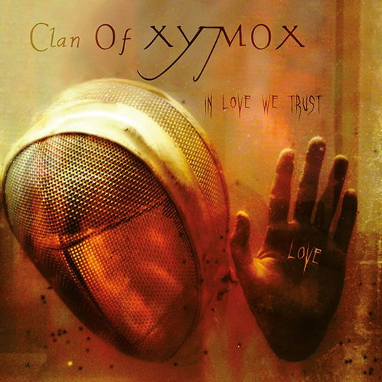 Cover for Clan of Xymox · In Love We Trust (Black / Orange Splatter Vinyl) (LP) [Limited edition] (2023)