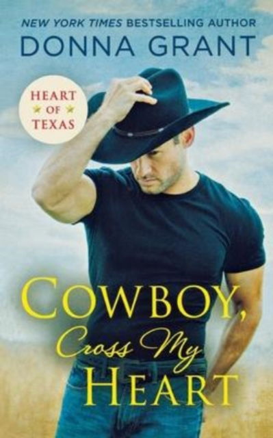 Cowboy, Cross My Heart - Donna Grant - Książki - St. Martins Press-3PL - 9781250852724 - 28 sierpnia 2018