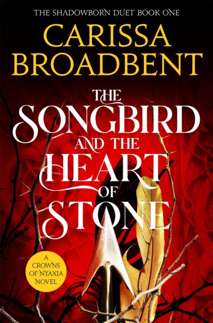 Cover for Carissa Broadbent · The Songbird and the Heart of Stone - Crowns of Nyaxia (Paperback Book) (2025)