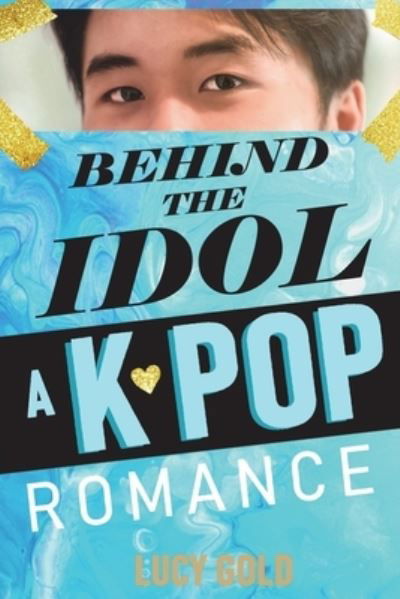 Cover for Lucy Gold · Behind the Idol - A K-pop Romance (Book) (2022)