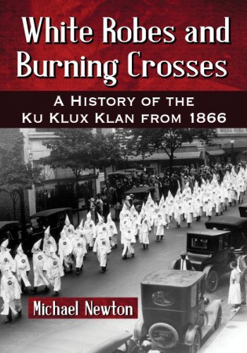 Cover for Michael Newton · White Robes and Burning Crosses: A History of the Ku Klux Klan from 1866 (Taschenbuch) (2014)