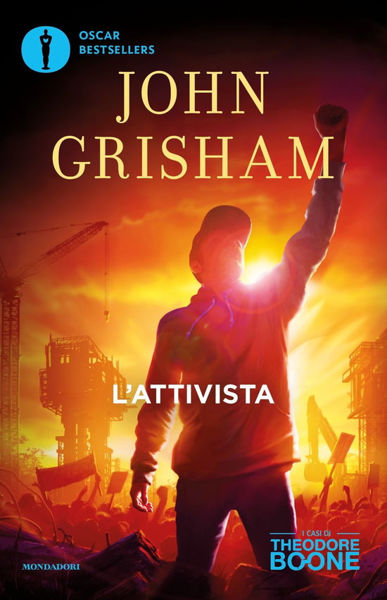 Cover for John Grisham · L' Attivista. I Casi Di Theodore Boone #04 (Book)