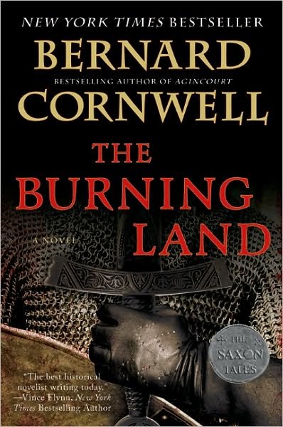Cover for Bernard Cornwell · The Burning Land: A Novel - Saxon Tales (Paperback Bog) [Reissue edition] (2010)