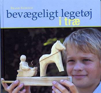 Cover for Frank Egholm · Bevægeligt legetøj i træ (Bound Book) [1e uitgave] (2003)
