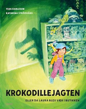 Cover for Ylva Karlsson · Krokodillejagten – eller da Laura blev væk i butikken (Hardcover Book) [1e uitgave] (2021)