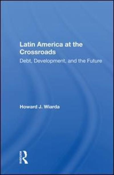 Cover for Howard J. Wiarda · Latin America at the Crossroads: Debt, Development, and the Future (Hardcover Book) (2019)