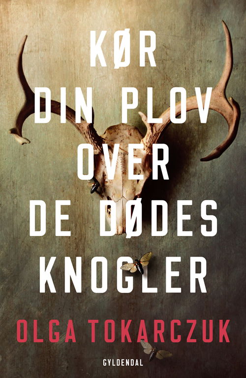 Cover for Olga Tokarczuk · Kør din plov over de dødes knogler (Taschenbuch) [2. Ausgabe] (2019)