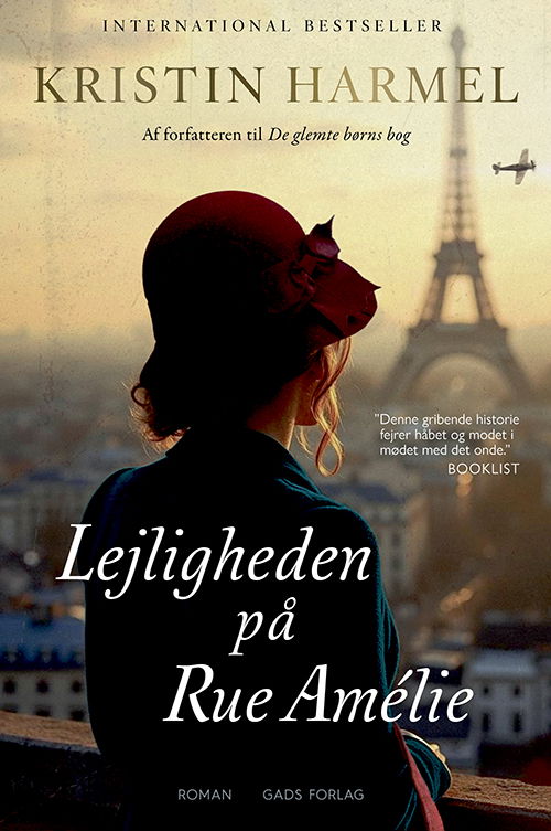 Cover for Kristin Harmel · Lejligheden på Rue Amélie (Gebundesens Buch) [1. Ausgabe] (2025)