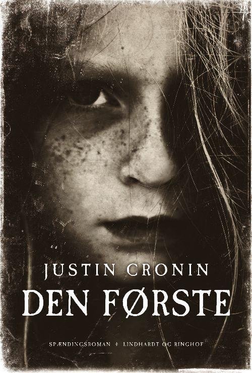 Cover for Justin Cronin · Den første (Gebundesens Buch) [1. Ausgabe] (2010)