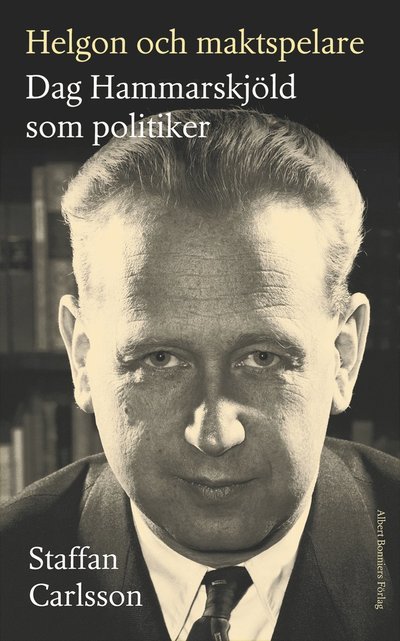 Cover for Staffan Carlsson · Helgon och maktspelare : Dag Hammarskjöld som politiker (Bound Book) (2023)