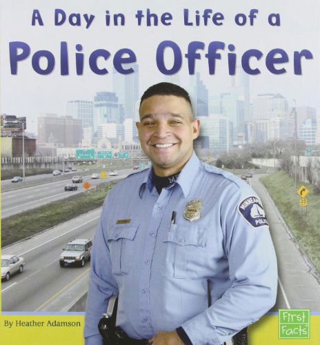 Cover for Heather Adamson · A Day in the Life of a Police Officer (Community Helpers at Work) (Hardcover Book) (2003)