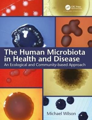 Cover for Michael Wilson · The Human Microbiota in Health and Disease: An Ecological and Community-based Approach (Paperback Book) (2018)