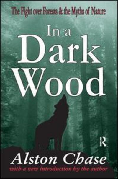 Cover for Alston Chase · In a Dark Wood: A Critical History of the Fight Over Forests (Hardcover Book) (2017)