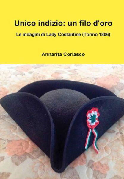 Cover for Annarita Coriasco · Unico indizio: un filo d'oro - Le indagini di Lady Costantine (Torino 1806) (Hardcover Book) (2017)