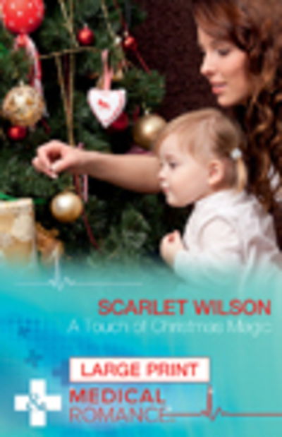 Cover for Scarlet Wilson · A Touch of Christmas Magic (Hardcover Book) [Large Type / Large Print edition] (2016)