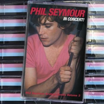 Cover for Phil Seymour · In Concert: Phil Seymour Archive Series Volume 3 (BLUE AND PINK CASSETTE) (Cassette) (2022)