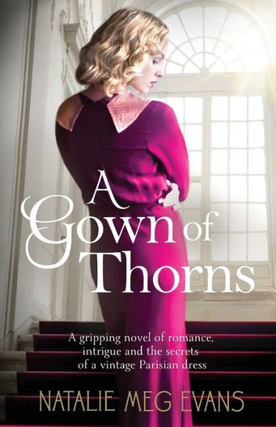 Cover for Natalie Meg Evans · A Gown of Thorns: A gripping novel of romance, intrigue and the secrets of a vintage Parisian dress (Paperback Book) (2023)