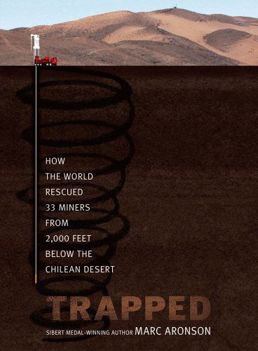 Cover for Marc Aronson · Trapped: How the World Rescued 33 Miners from 2,000 Feet Below the Chilean Desert (Hardcover Book) [First edition] (2011)