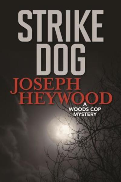 Cover for Joseph Heywood · Strike Dog: A Woods Cop Mystery (Paperback Book) (2019)