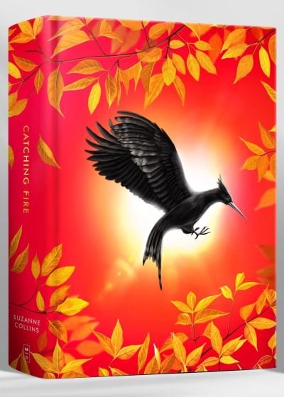 The Hunger Games: Catching Fire Deluxe HB - Suzanne Collins - Books - Scholastic - 9780702332999 - October 26, 2023
